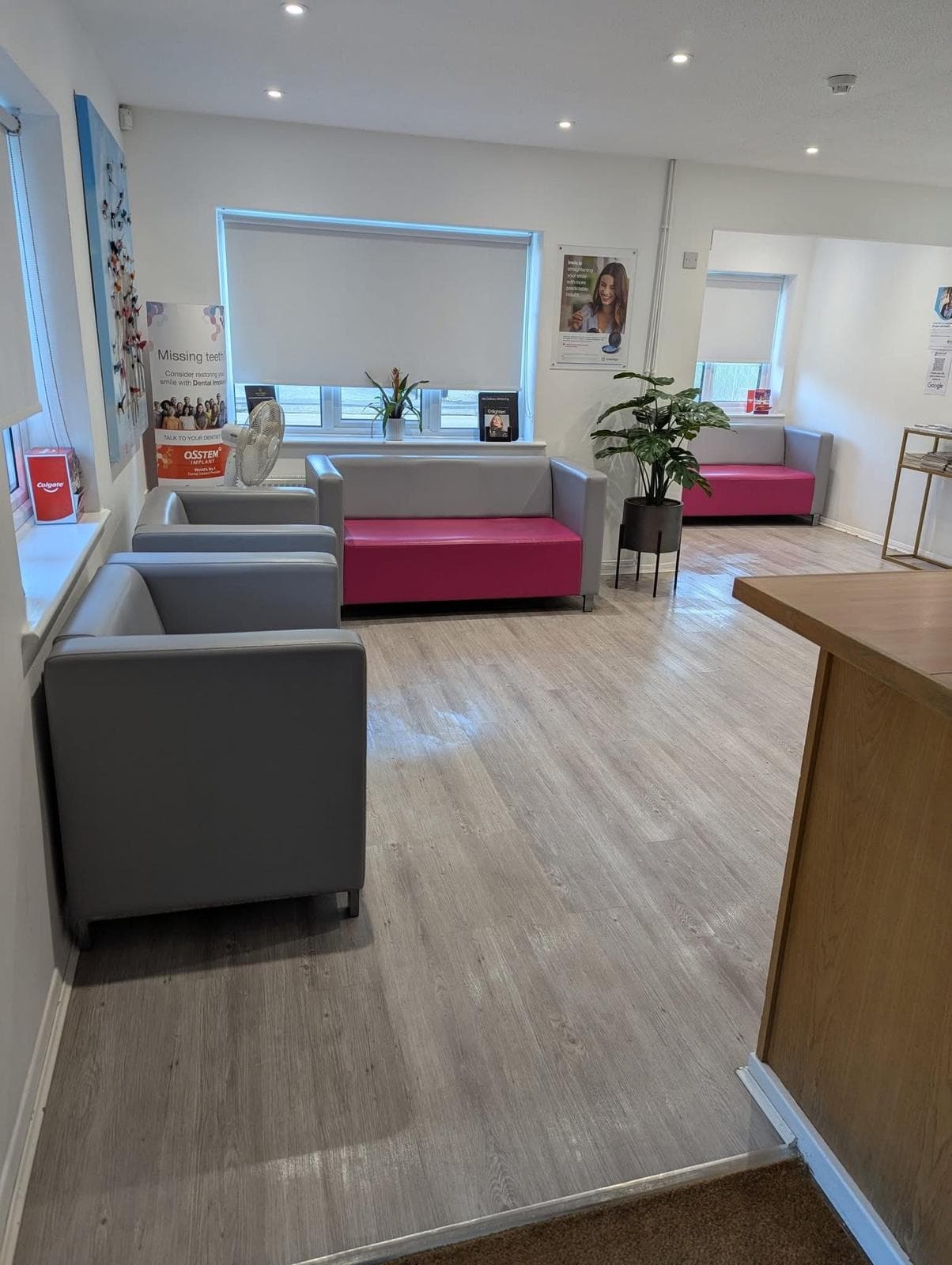Reception and waiting area with soft seating, cleaned and presentable